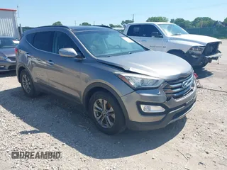 2014 Hyundai Santa Fe with VIN 5XYZU3LB1EG180004, listed as a IAAI auction lot 42538867 with 147,896 mi miles and . Bid and sale history available at DreamBid. Image 1.