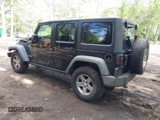2012 Jeep Wrangler Unlimited Call of Duty MW3 with VIN 1C4BJWFG5CL103267, listed as a IAAI auction lot 42334345 with 135,324 mi miles and . Bid and sale history available at DreamBid. Image 3.