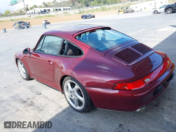 1997 Porsche 911 with VIN WP0AA2998VS322699, listed as a IAAI auction lot 41892833 with 117,174 mi miles and . Bid and sale history available at DreamBid. Image 3.