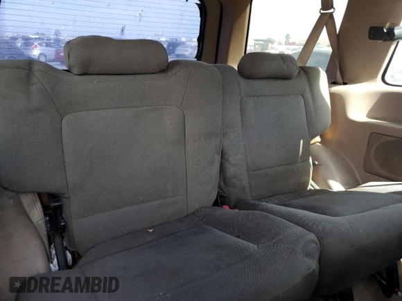 2002 Ford Explorer Sport Value z VIN 1FMYU60E62UB91081, wystawiony jako Copart lot #75688824 z przebiegiem 229 382 mil mil oraz Szkody całkowita. Historia ofert i sprzedaży dostępna na DreamBid. Obrazek 11.