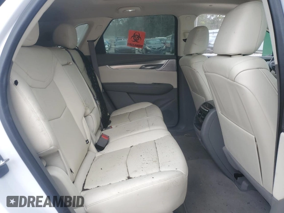 2022 Cadillac XT5 FWD Premium Luxury z VIN 1GYKNCRS5NZ174787, wystawiony jako Copart lot #47541075 z przebiegiem 31 357 mil mil oraz Szkoda całkowita • Salvage title. Historia ofert i sprzedaży dostępna na DreamBid. Obrazek 11.