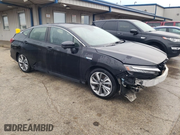 2018 Honda Clarity Plug-In Hybrid with VIN JHMZC5F14JC018446, listed as a Copart auction lot 77164344 with 61,741 mi miles and Salvage Title. Bid and sale history available at carsss.com. Image 4.