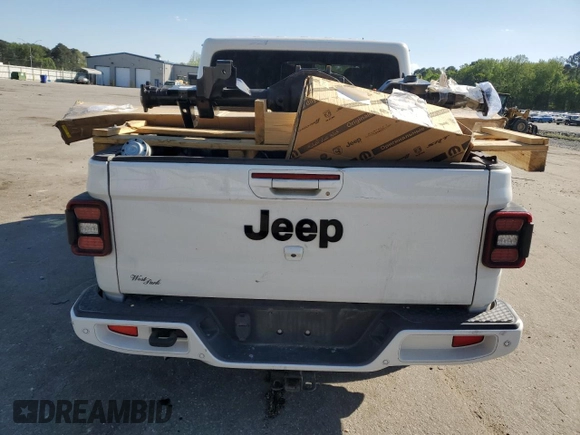 2021 Jeep Gladiator Overland with VIN 1C6HJTFG2ML557221, listed as a Copart auction lot 52453215 with 70,189 mi miles and Salvage title. Bid and sale history available at DreamBid. Image 6.