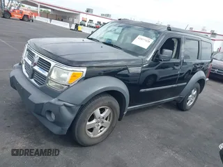 2007 Dodge Nitro SXT with VIN 1D8GT28K27W502900, listed as a IAAI auction lot 42077428 with 166,114 mi miles. Bid and sale history available at carsss.com. Image 6.