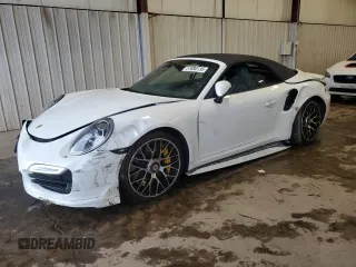 2015 Porsche 911 Turbo z VIN WP0CD2A91FS178328, wystawiony jako Copart lot #57880135 z przebiegiem 34 588 mil mil oraz Szkoda całkowita • Salvage title. Historia ofert i sprzedaży dostępna na DreamBid. Obrazek 1.