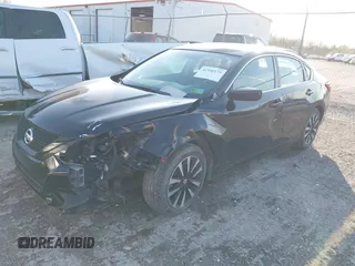 2018 Nissan Altima SV with VIN 1N4AL3AP0JC209978, listed as a IAAI auction lot 41958173 with 104,425 mi miles and . Bid and sale history available at DreamBid. Image 2.