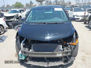 2020 Chevrolet Bolt EV LT z VIN 1G1FY6S07L4144203, wystawiony jako IAAI lot #42443911 z przebiegiem 41 666 mil mil oraz . Historia ofert i sprzedaży dostępna na DreamBid. Obrazek 13.