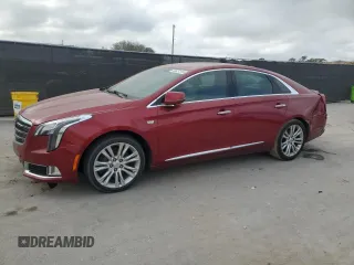2019 Cadillac XTS Luxury z VIN 2G61M5S37K9125988, wystawiony jako Copart lot #44427315 z przebiegiem 148 565 mil mil oraz Szkody całkowita. Historia ofert i sprzedaży dostępna na DreamBid. Obrazek 1.
