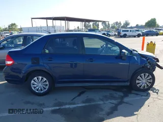 2009 Nissan Versa S with VIN 3N1BC11E49L493099, listed as a IAAI auction lot 42170459 with 209,788 mi miles and . Bid and sale history available at DreamBid. Image 14.