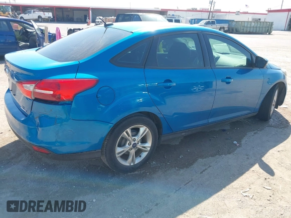 2014 Ford Focus SE with VIN 1FADP3F29EL122925, listed as a IAAI auction lot 42044004 with 216,490 mi miles. Bid and sale history available at carsss.com. Image 4.