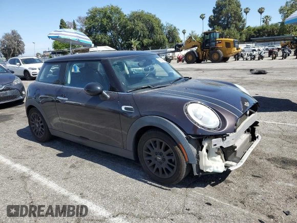 2014 MINI Hardtop with VIN WMWXM5C57ET934120, listed as a Copart auction lot 58594845 with 115,248 mi miles and Salvage title. Bid and sale history available at DreamBid. Image 4.