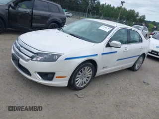 2011 Ford Fusion Hybrid z VIN 3FADP0L34BR202769, wystawiony jako IAAI lot #42504494 z przebiegiem 33 902 mil mil oraz . Historia ofert i sprzedaży dostępna na DreamBid. Obrazek 2.