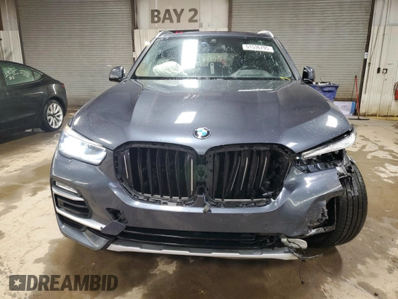 2021 BMW X5 xDrive40i with VIN 5UXCR6C00M9G00599, listed as a Copart auction lot 51536795 with 55,422 mi miles and Salvage title. Bid and sale history available at DreamBid. Image 5.