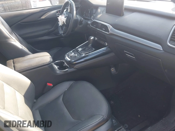 2020 Mazda CX-9 Grand Touring with VIN JM3TCADY0L0422548, listed as a IAAI auction lot 41839601 with 116,952 mi miles and . Bid and sale history available at DreamBid. Image 5.