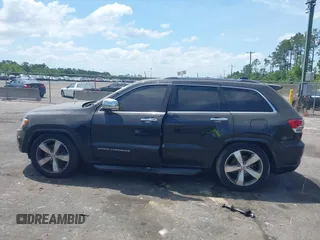 2015 Jeep Grand Cherokee Overland with VIN 1C4RJFCT9FC859740, listed as a IAAI auction lot 42187933 with 231,481 mi miles. Bid and sale history available at carsss.com. Image 14.