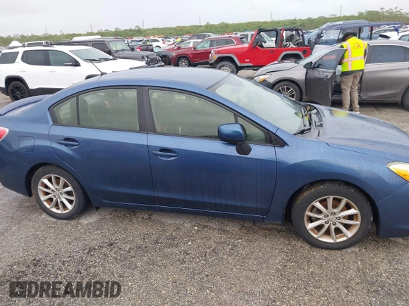 2013 Subaru Impreza Premium z VIN JF1GJAB66DH003999, wystawiony jako IAAI lot #40540006 z przebiegiem Nie podano mil oraz . Historia ofert i sprzedaży dostępna na DreamBid. Obrazek 13.