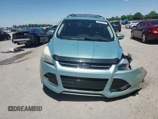 2013 Ford Escape Titanium с VIN 1FMCU0J98DUB77372, выставлен на аукционе Copart как лот 58006235 с пробегом 200 929 миль миль и Списание • Salvage title. История ставок и продаж доступна на DreamBid. Изображение 15.