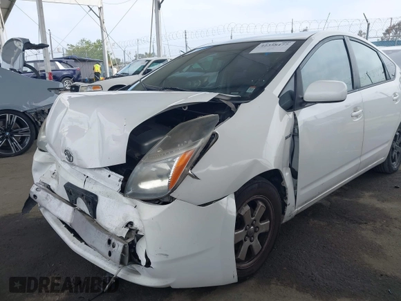 2008 Toyota Prius z VIN JTDKB20U483454957, wystawiony jako IAAI lot #42358477 z przebiegiem 256 781 mil mil oraz . Historia ofert i sprzedaży dostępna na DreamBid. Obrazek 6.