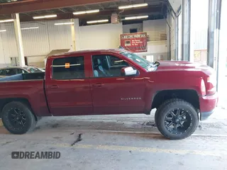 2018 Chevrolet Silverado 1500 LT with VIN 3GCUKREC0JG580317, listed as a IAAI auction lot 41868522 with 75,738 mi miles. Bid and sale history available at carsss.com. Image 13.
