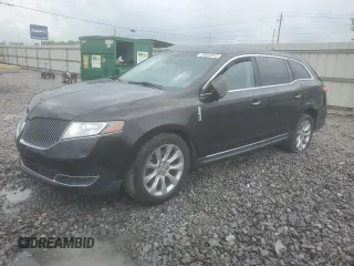 2014 Lincoln MKT EcoBoost z VIN 2LMHJ5AT9EBL51436, wystawiony jako Copart lot #54083945 z przebiegiem 152 211 mil mil oraz Szkoda całkowita • Salvage title. Historia ofert i sprzedaży dostępna na DreamBid. Obrazek 1.