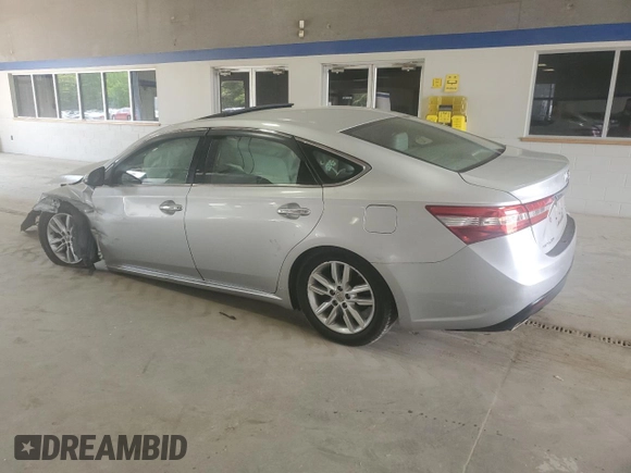 2013 Toyota Avalon XLE with VIN 4T1BK1EB0DU001291, listed as a Copart auction lot 54129175 with 107,242 mi miles and Salvage Title. Bid and sale history available at DreamBid. Image 2.