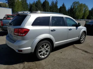2014 Dodge Journey Limited with VIN 3C4PDDDG5ET251642, listed as a Copart auction lot 54056985 with 120,065 mi miles and Salvage Title. Bid and sale history available at carsss.com. Image 3.