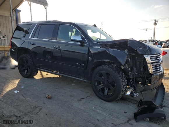 2018 Chevrolet Tahoe Premier with VIN 1GNSCCKC4JR130828, listed as a Copart auction lot 83080234 with 117,717 mi miles and Salvage Title. Bid and sale history available at carsss.com. Image 4.