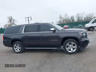 2015 Chevrolet Suburban LTZ with VIN 1GNSKKKC4FR712965, listed as a IAAI auction lot 41928053 with 188,571 mi miles. Bid and sale history available at carsss.com. Image 13.