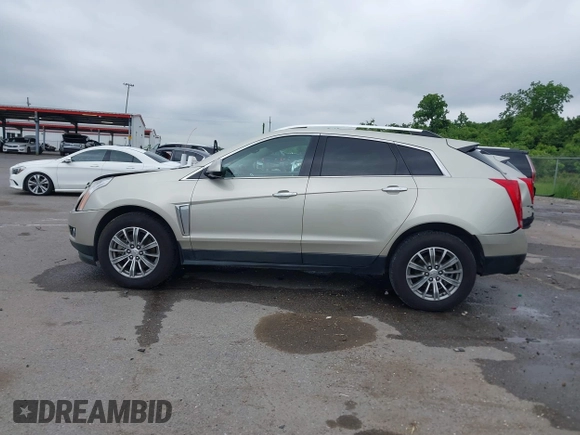 2015 Cadillac SRX Performance Collection with VIN 3GYFNCE34FS639168, listed as a IAAI auction lot 42191995 with 101,358 mi miles and . Bid and sale history available at DreamBid. Image 14.