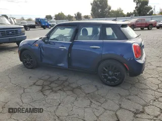 2015 MINI Hardtop 4 Door z VIN WMWXS5C5XFT831166, wystawiony jako Copart lot #78248204 z przebiegiem 69 459 mil mil oraz Szkoda całkowita • Salvage title. Historia ofert i sprzedaży dostępna na DreamBid. Obrazek 2.