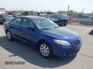 2007 Toyota Camry CE with VIN JTNBE46K373056707, listed as a IAAI auction lot 42128026 with 242,887 mi miles and . Bid and sale history available at DreamBid. Image 1.