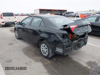2019 Toyota Corolla L with VIN 5YFBURHE5KP945925, listed as a IAAI auction lot 41493079 with 96,849 mi miles and . Bid and sale history available at carsss.com. Image 3.