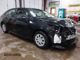 2021 Toyota Corolla L with VIN 5YFDPMAE5MP208692, listed as a IAAI auction lot 41472857 with 63,736 mi miles. Bid and sale history available at carsss.com. Image 1.