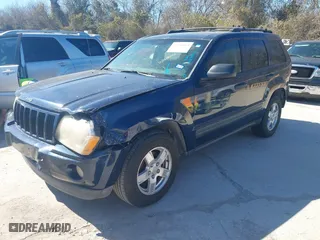 2006 Jeep Grand Cherokee Laredo with VIN 1J4GS48K16C251567, listed as a IAAI auction lot 41736953 with 222,519 mi miles. Bid and sale history available at carsss.com. Image 2.