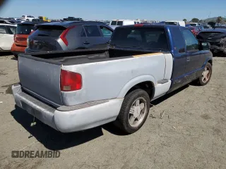 2000 GMC Sonoma SLS z VIN 1GTCS19W0Y8206050, wystawiony jako Copart lot #49122164 z przebiegiem 264 070 mil mil oraz Szkody całkowita. Historia ofert i sprzedaży dostępna na DreamBid. Obrazek 3.