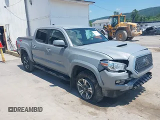 2019 Toyota Tacoma SR with VIN 3TMCZ5AN1KM274625, listed as a IAAI auction lot 42660593 with 163,460 mi miles and . Bid and sale history available at DreamBid. Image 1.