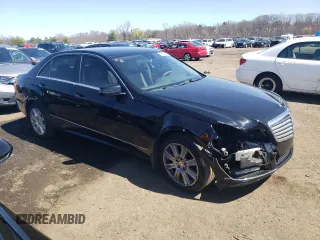 2013 Mercedes-Benz E 350 Luxury with VIN WDDHF8JB6DA661022, listed as a Copart auction lot 52030585 with 165,279 mi miles and Salvage Title. Bid and sale history available at DreamBid. Image 4.