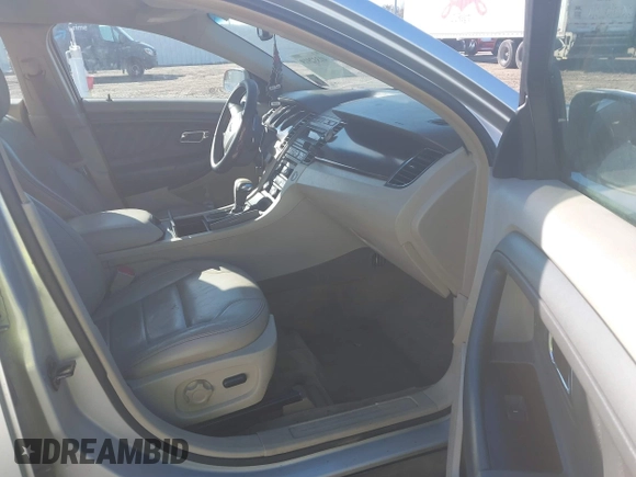 2012 Ford Taurus SEL with VIN 1FAHP2EW0CG144849, listed as a IAAI auction lot 41332919 with 257,793 mi miles and . Bid and sale history available at DreamBid. Image 5.