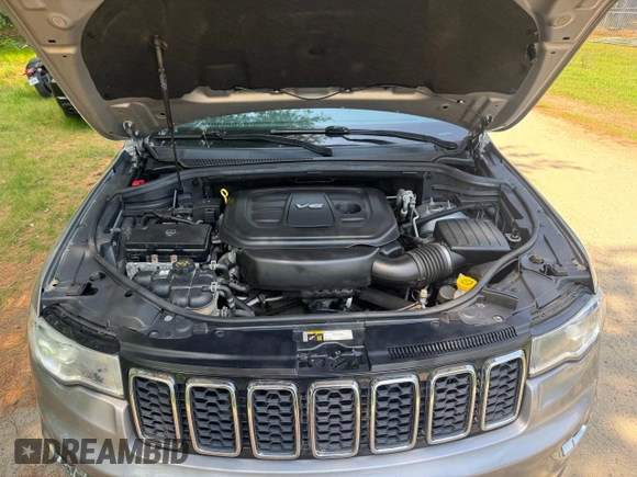 2018 Jeep Grand Cherokee Limited z VIN 1C4RJFBG1JC171096, wystawiony jako Copart lot #62341065 z przebiegiem 149 693 mil mil oraz Czysty tytuł • Clean title. Historia ofert i sprzedaży dostępna na DreamBid. Obrazek 7.
