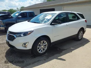 2020 Chevrolet Equinox LS z VIN 3GNAXSEVXLS602800, wystawiony jako IAAI lot #42268052 z przebiegiem 96 159 mil mil oraz . Historia ofert i sprzedaży dostępna na DreamBid. Obrazek 2.