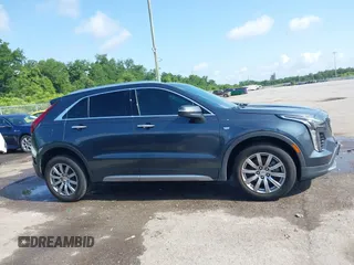 2021 Cadillac XT4 FWD Premium Luxury with VIN 1GYFZCR42MF007617, listed as a IAAI auction lot 42437974 with 126,071 mi miles and . Bid and sale history available at DreamBid. Image 13.