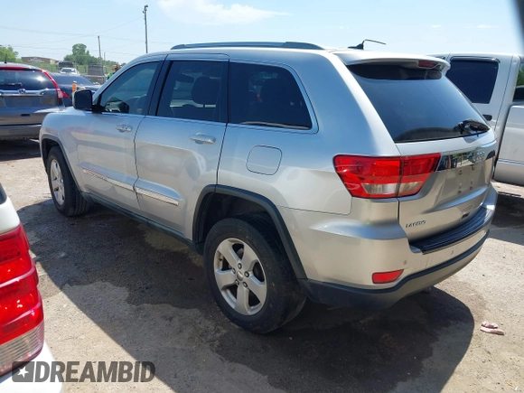 2012 Jeep Grand Cherokee Laredo with VIN 1C4RJEAG4CC167557, listed as a IAAI auction lot 42047720 with 195,631 mi miles. Bid and sale history available at carsss.com. Image 3.