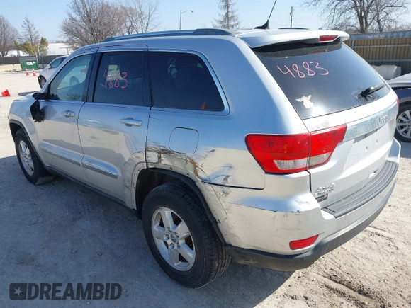 2011 Jeep Grand Cherokee Laredo z VIN 1J4RR4GG3BC589578, wystawiony jako IAAI lot #41804883 z przebiegiem 113 016 mil mil oraz . Historia ofert i sprzedaży dostępna na DreamBid. Obrazek 3.