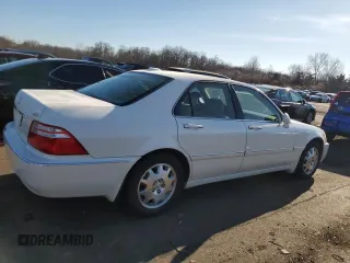 2004 Acura RL w/Navigation System with VIN JH4KA96684C004211, listed as a Copart auction lot 82308804 with 157,256 mi miles and Salvage Title. Bid and sale history available at carsss.com. Image 3.