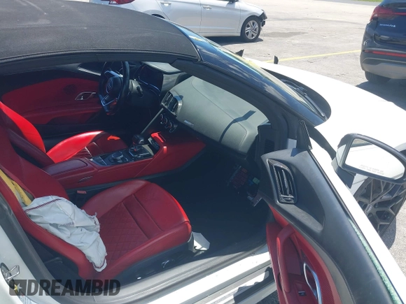 2017 Audi R8 z VIN WUAVACFX0H7903232, wystawiony jako IAAI lot #42247728 z przebiegiem 74 755 mil mil oraz . Historia ofert i sprzedaży dostępna na DreamBid. Obrazek 5.