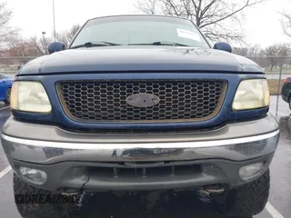 2003 Ford F-150 XL with VIN 1FTRX18L73NA26027, listed as a IAAI auction lot 41843867 with 1 mi miles. Bid and sale history available at carsss.com. Image 6.