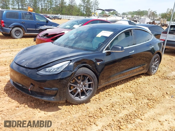 2018 Tesla Model 3 Long Range Battery with VIN 5YJ3E1EB1JF122786, listed as a IAAI auction lot 42010451 with 85,510 mi miles and . Bid and sale history available at DreamBid. Image 2.