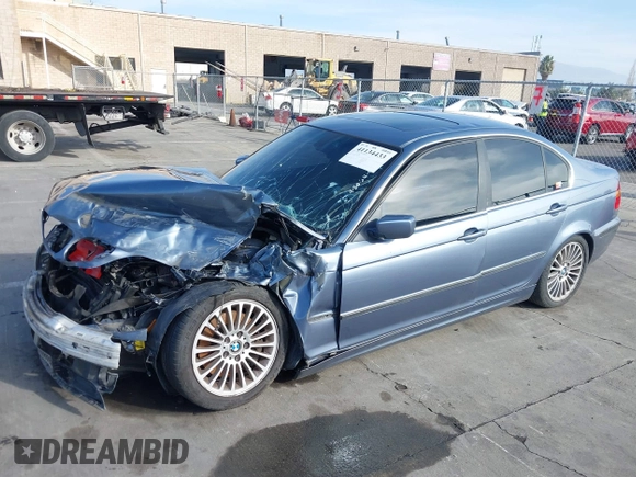 2003 BMW 3 Series 330i with VIN WBAEV53453KM03321, listed as a IAAI auction lot 41134433 with 186,586 mi miles. Bid and sale history available at carsss.com. Image 19.