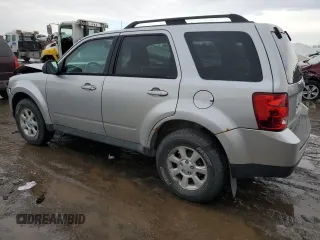 2011 Mazda Tribute Sport with VIN 4F2CY9C70BKM03826, listed as a Copart auction lot 45222665 with 171,082 mi miles and Salvage Title. Bid and sale history available at DreamBid. Image 2.