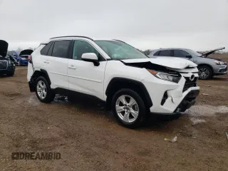 2021 Toyota RAV4 XLE with VIN 2T3P1RFV6MW228427, listed as a Copart auction lot 55323325 with 54,002 mi miles and Salvage title. Bid and sale history available at DreamBid. Image 4.